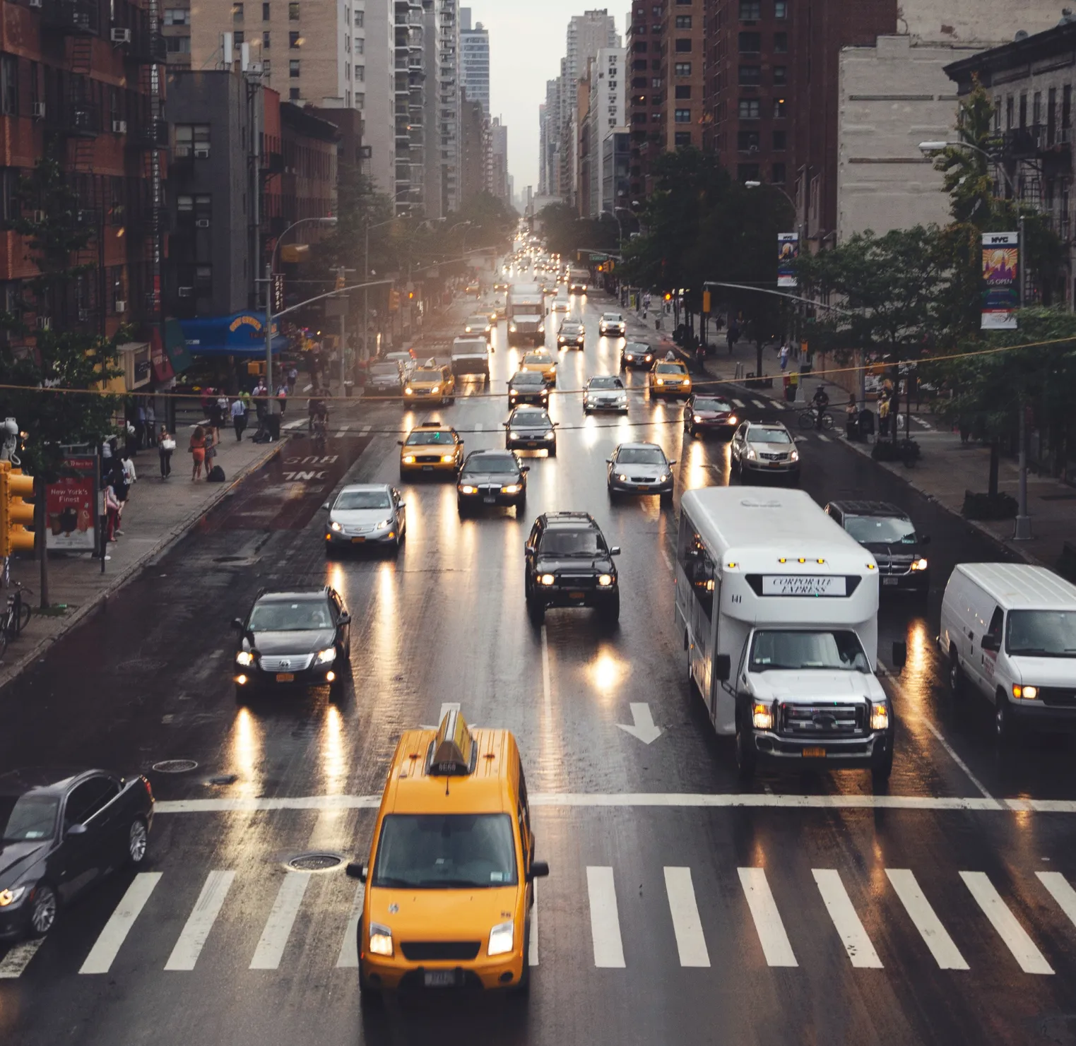 A busy city street filled with lots of traffic.